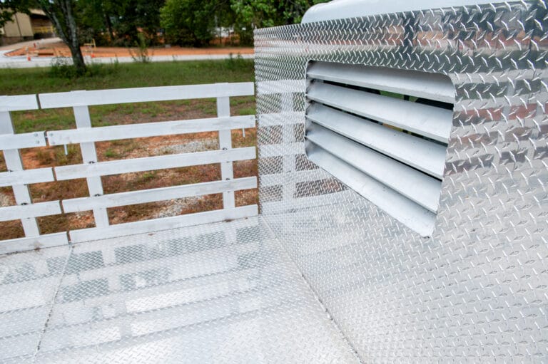 Stake body truck bed interior with vent