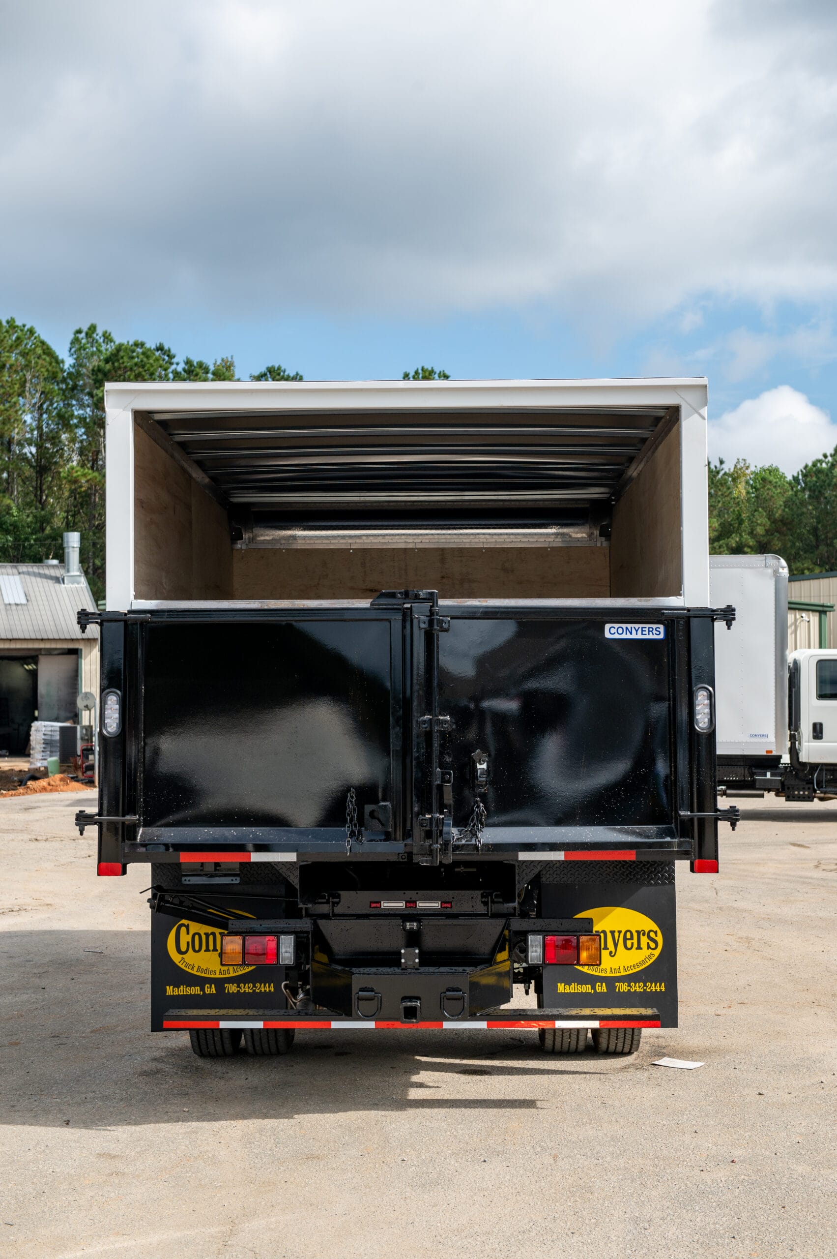 Dump truck rear doors