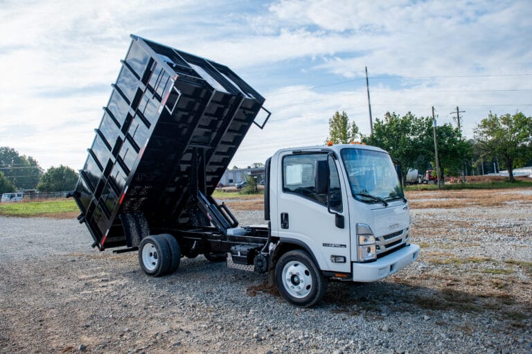 Dump truck with truck bed elevated