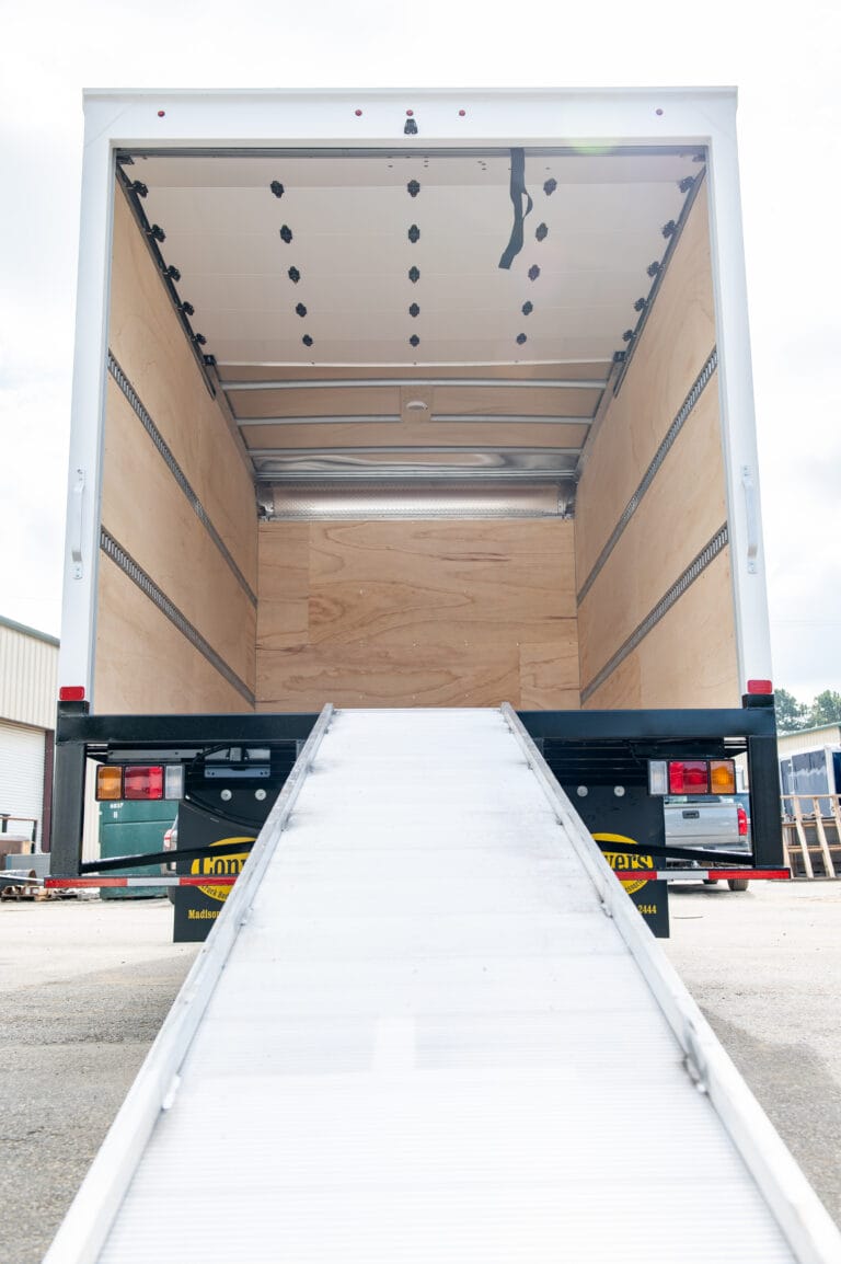 Dry Van body with rolling ramp